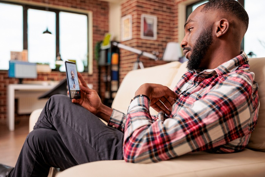 Man participating in virtual counseling as part of Pennsylvania rehabs for men